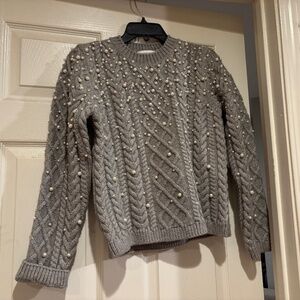 Pearl sweater.